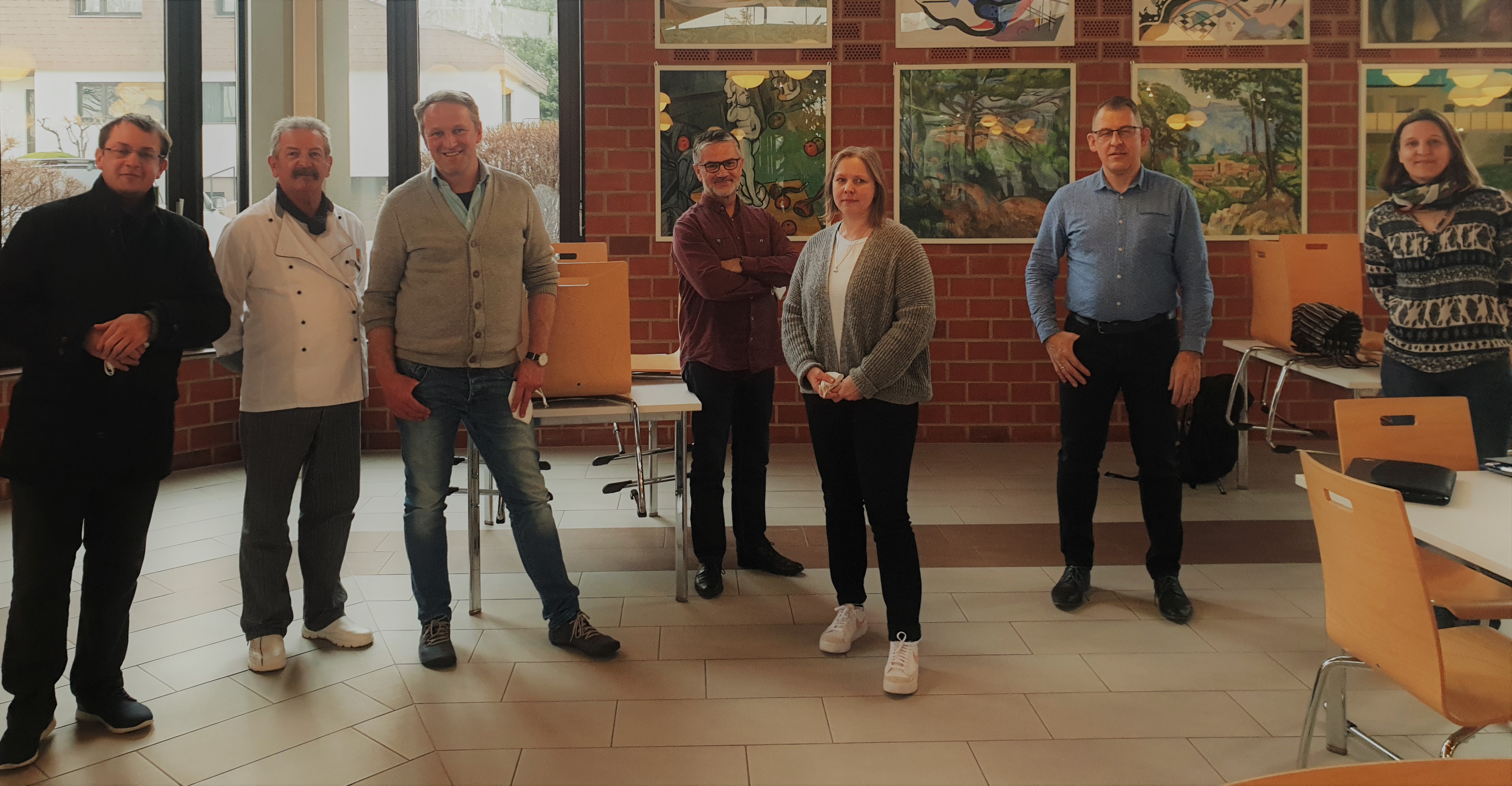 Gruppenfoto des Coachings mit sieben Menschen